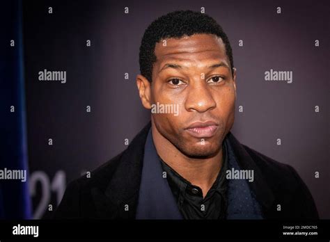 Jonathan Majors Poses For Photographers Upon Arrival At The Opening Of