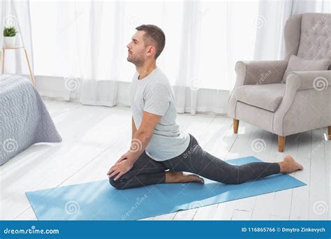 Serious Nice Man Doing A Physical Exercise Stock Photo Image Of