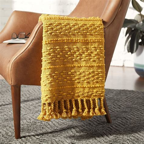 yellow textured throw blanket