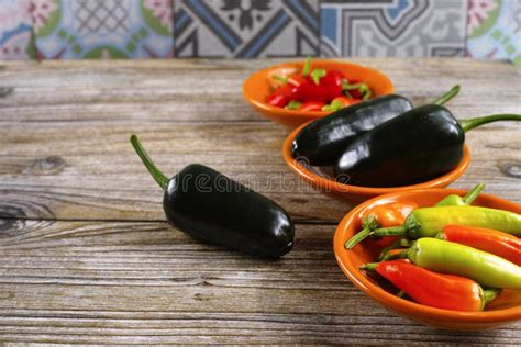 Mexican Hot Chili Peppers Colorful Mix Jalapeno On Orange Bowls Stock Image Image Of Jalapeno