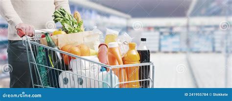 Man Pushing A Trolley At The Supermarket Stock Photo Image Of Grocery