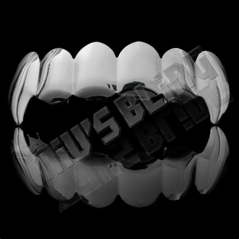 14k Silver Vampire Fang Grillz | Hip Hop Grills | Niv's Bling