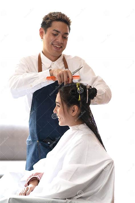 Asian Male Hairdresser Make Hairstyles For Asian Female Customers In