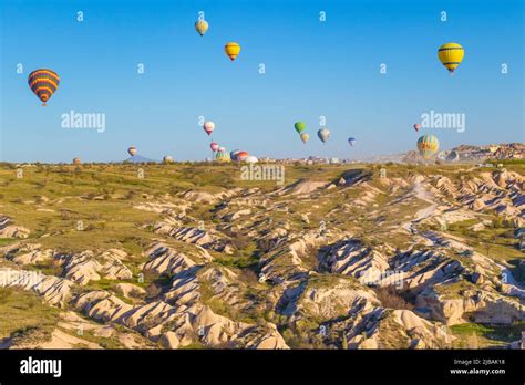 Colorful Hot Air Balloons Over Cappadocia A Semi Arid Region In Central