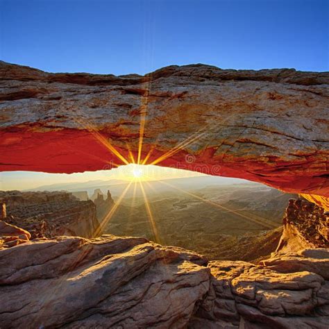 Sunrise At Mesa Arch In Canyonlands National Park Stock Photo Image