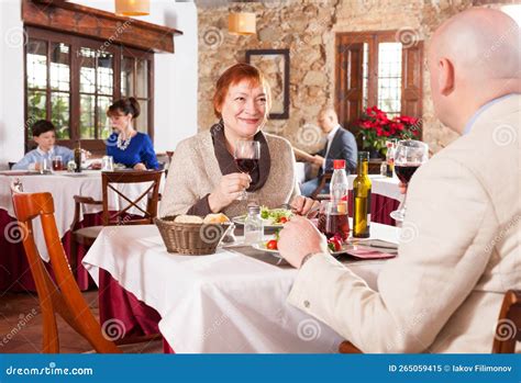 Mature Woman With Son In Restaurant Stock Image Image Of Portrait Wine