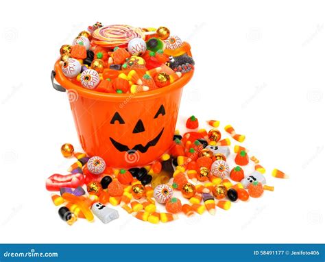 Halloween Jack O Lantern Pail Overflowing With Candy Stock Photo