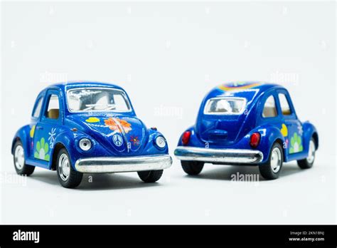 Old vintage blue car toy front and back Stock Photo - Alamy