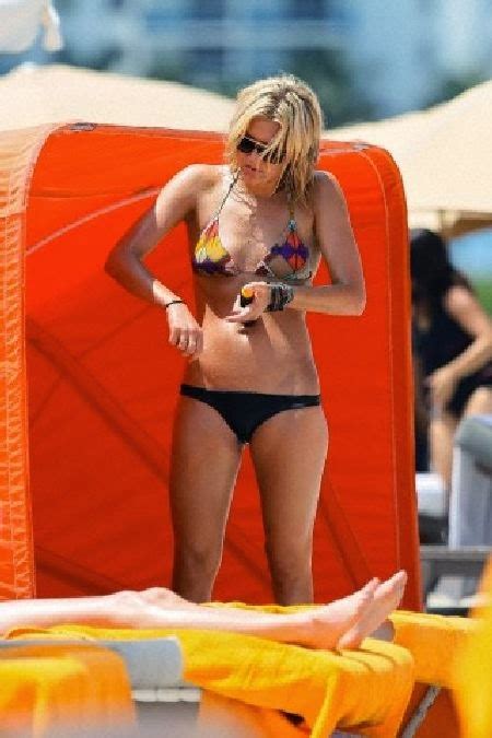 Softly Temperature PHOTOS Charissa Thompson Displays A Colorful Bikini In Miami USA