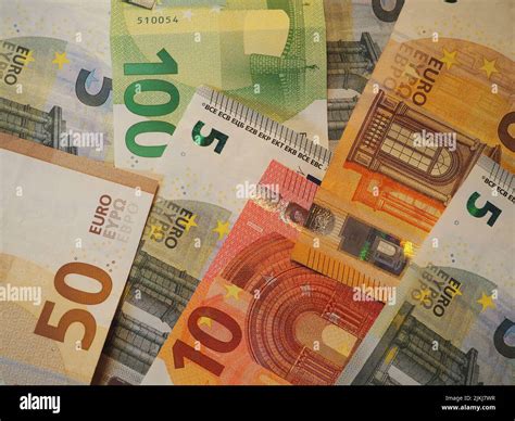 Euro banknote covering the full picture, euro banknotes Stock Photo - Alamy