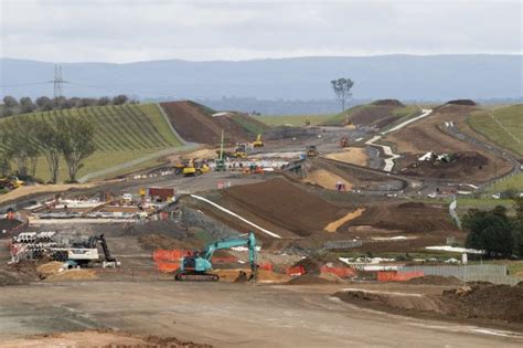 Western Sydney Airport M12 Motorway Rises Out Of Paddocks