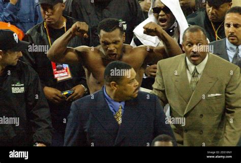 A Victorious Mike Tyson Leaves After Defeating Lou Savarese In Their