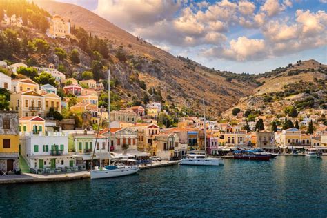 View Of The Beautiful Greek Island Of Symi Simi With Colourful Houses