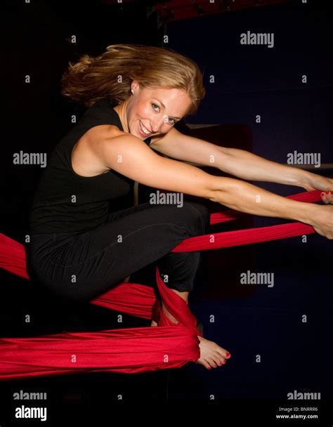 Attractive Blonde Woman Practices Aerial Silks Arts Stock Photo Alamy