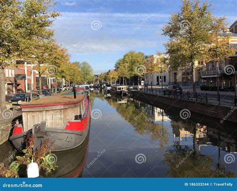 Canal in Groningen editorial stock image. Image of housing - 186333244