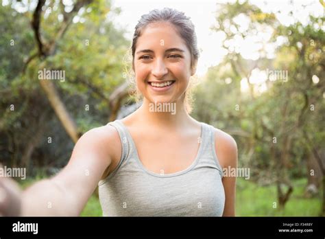 Smiling Athletic Brunette Taking Selfie Stock Photo Alamy