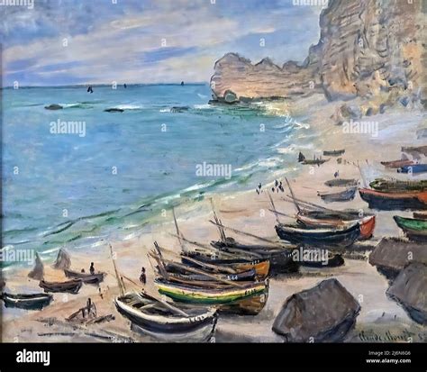 Claude Monet Boats On The Beach At Etretat Is An Oil Painting On