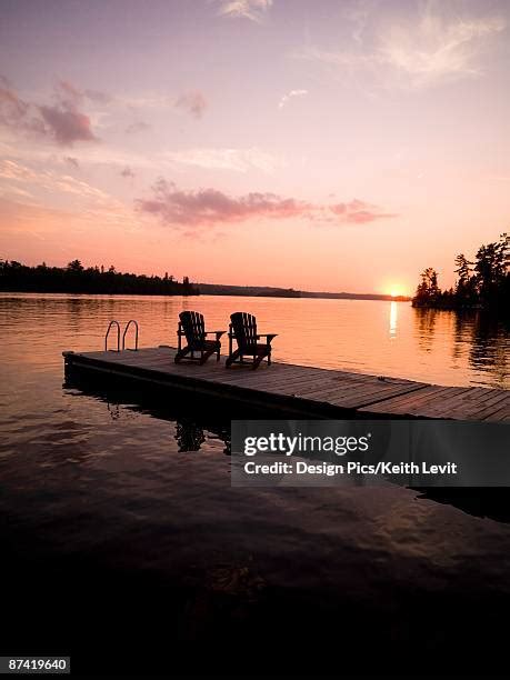 Adirondack Deck Chairs On Lake Dock Photos And Premium High Res