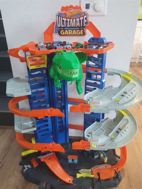 Hot Wheels City Megacity Parkgarage mit T Rex Angriff Gebraucht in Höri für CHF 80 nur