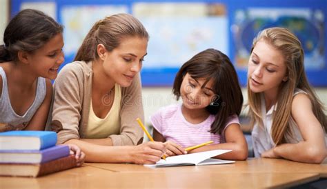 She Inspires Her Students To Learn Shot Of A Teacher Helping Her