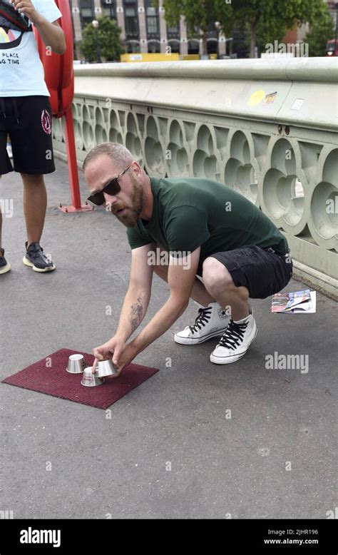 The Shell Game Three Cups Trick Illegal Scam On Westminster Bridge