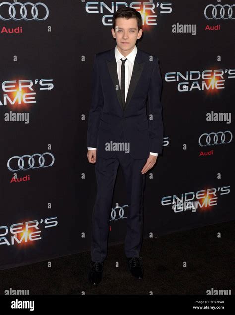 Asa Butterfield Attending The Enders Game Premiere Held At The Tlc