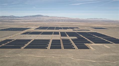 5k Stock Footage Aerial Video Approach Mojave Desert Solar Energy Array