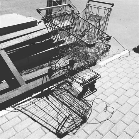 Premium Photo High Angle View Of Shopping Carts On Sidewalk