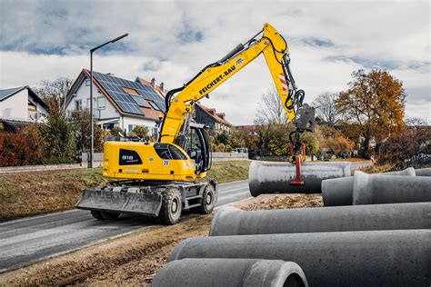 A 918 Compact Litronic Wheeled Excavator LECTURA Press