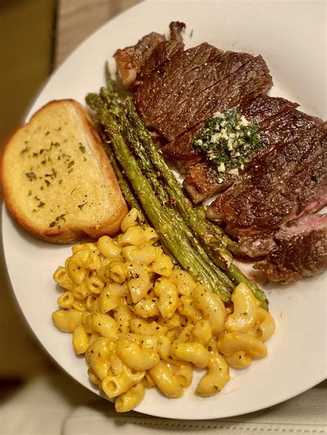 [homemade] Steak With Garlic Butter Roasted Parmesan Asparagus Mac And Cheese And Texas Toast