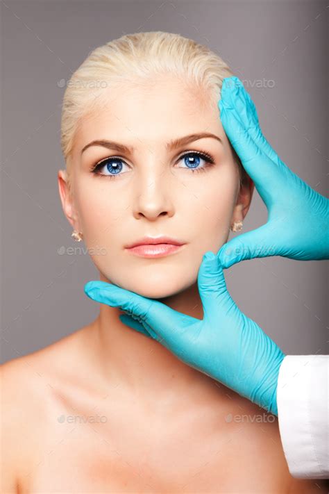 Cosmetic Plastic Surgeon Touching Aesthetics Face Stock Image