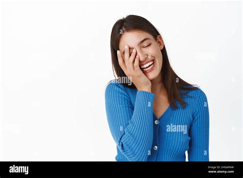 Close Up Portrait Of Beautiful Brunette Woman Laughing And Smiling