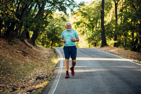 Old Man Running Marathon Stock Photos Pictures And Royalty Free Images