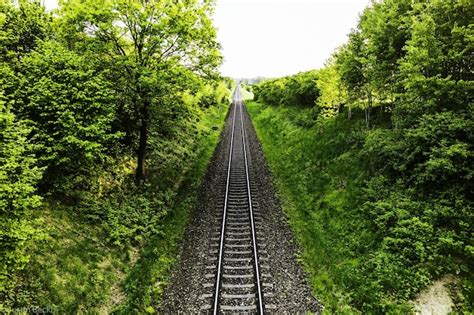 Premium Photo Funicular Railroad Track On Green Hill