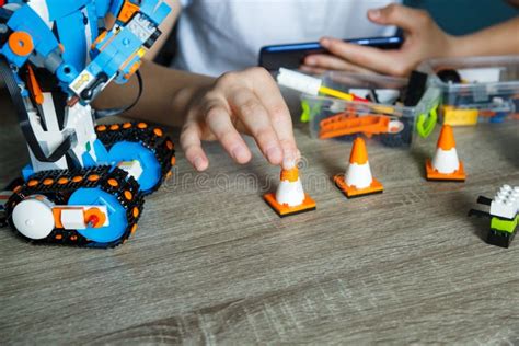 Lego Boost Vernie The Robot In The Boy`s Hands Boy In White T Shirt Is