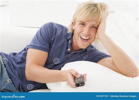 A Man Holding A Remote Control Royalty Free Stock Photography