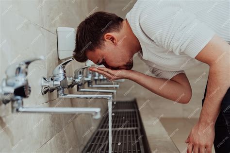Premium Photo A Muslim Performing Ablution Ritual Religious