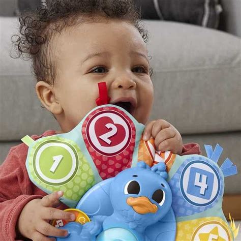 Adam le Paon Linkimals Fisher Price King Jouet Activités d éveil