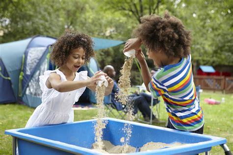 Siblings Playing In Sand Pit First4adoption