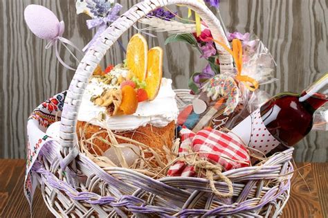 Premium Photo Decorative Easter Basket With Cake Colored Eggs And