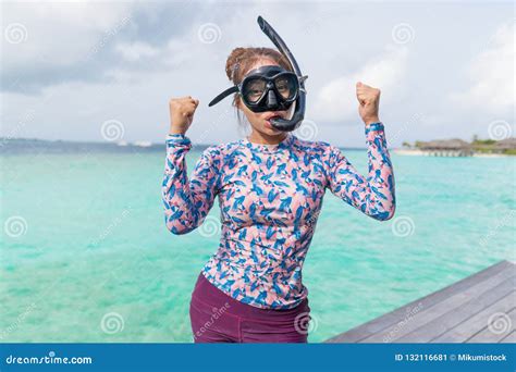 Asian Beautiful Woman Is Snorkeling In The Lagoon Sea Background Stock