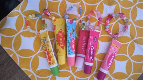 Carmed lipbalm hidratante labial chaveiro miçanga Hidratante labial