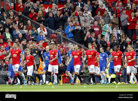 Players Walk Onto The Pitch Prior To Kick Off Hi Res Stock Photography