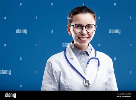 Cheering Woman Is A Female Medical Doctor With A Reassuring Smile