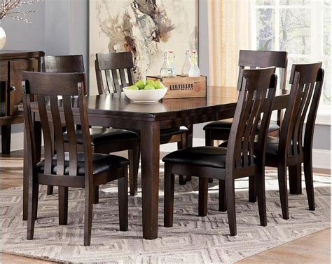 Haddigan Dark Brown Rectangular Extendable Dining Table By Ashley