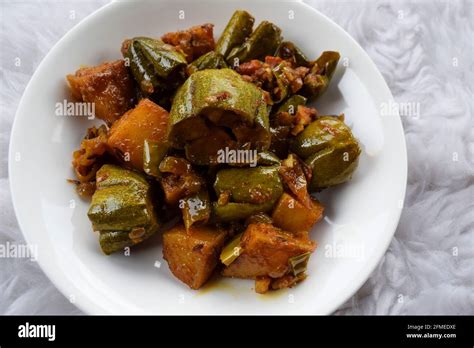 Parwal Aloo Ki Sabji Also Known As Pointed Gourd And Potato Fry Curry