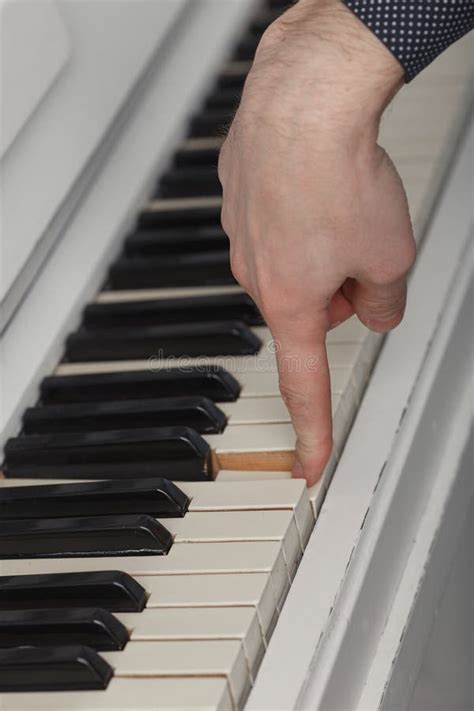 Pianist Hand Touching One Of The Piano Keys Stock Image Image Of