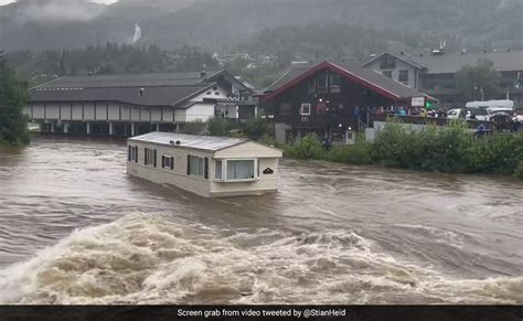 Video Two Mobile Homes Swept Away In Norway Floods Crashes Into Bridge