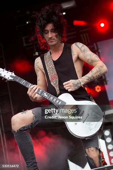 Musician Cameron Liddell of Asking Alexandria performs at MAPFRE ...