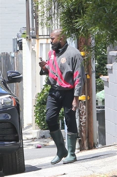 Kanye West Looks Unrecognizable With A Big Smile Full Beard And Meggings In Rare New Photos